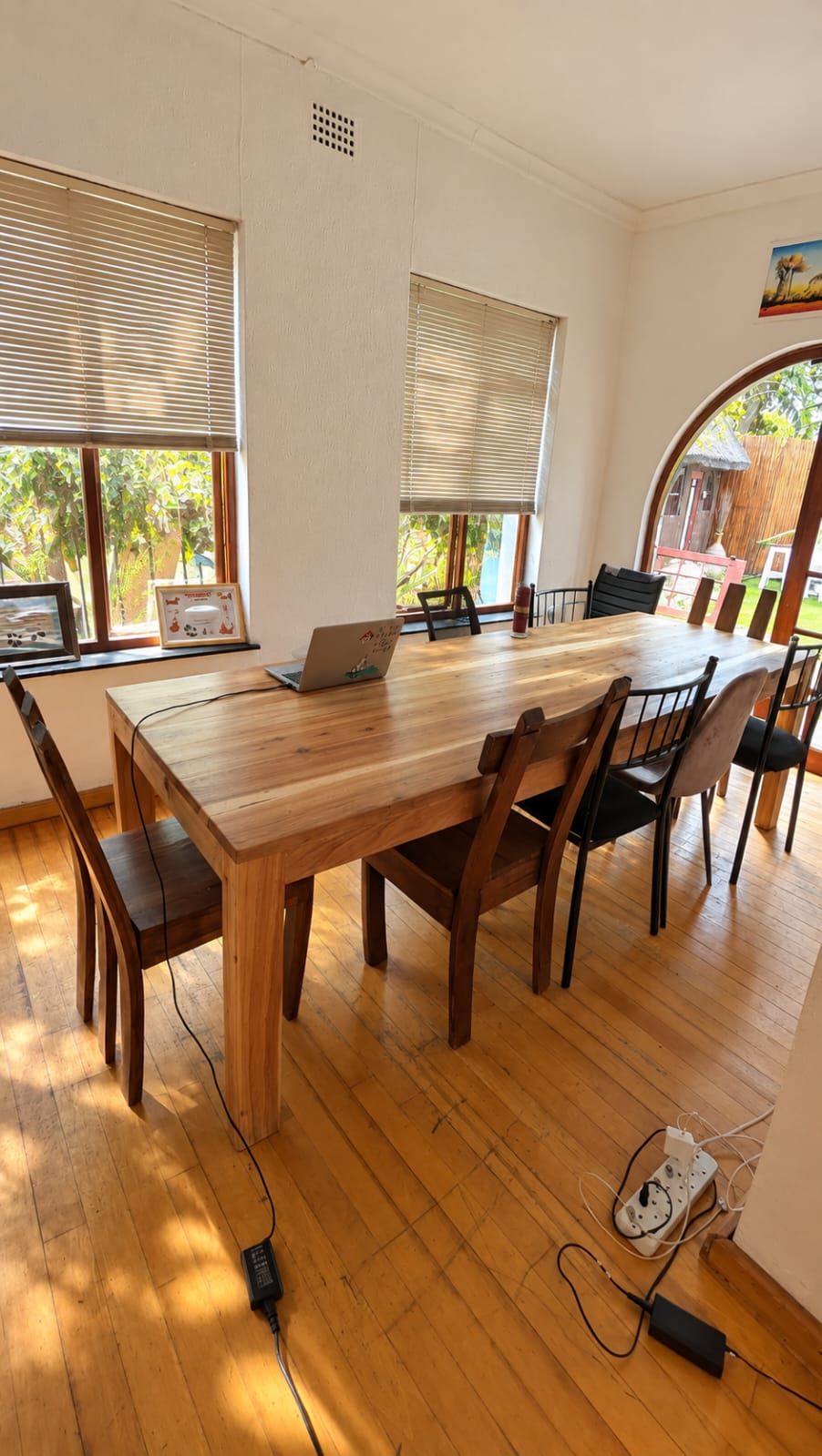 The big co-working table at Khaya, room for ten laptops