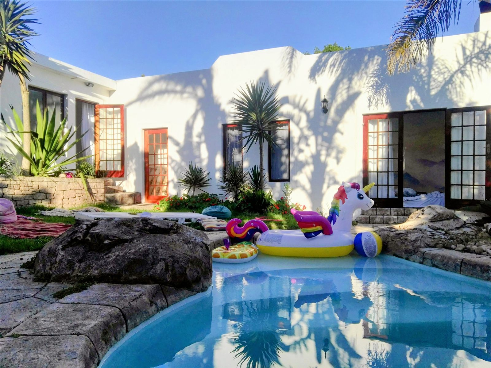 The pool at Khaya Kite & Yoga House in Bloubergstrand, unicorn included