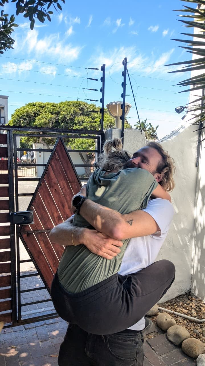 A welcome hug at the Khaya gate